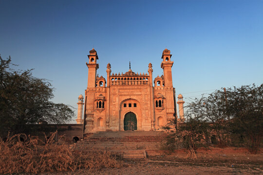 View of Multan Fort with ancient stone architecture and lush green surroundings, Multan, Punjab, Pakistan.