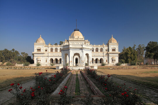 View of Sadiq Ghar Palace with majestic garden and grand dome, Dera Nawab Sahib, Punjab, Pakistan.