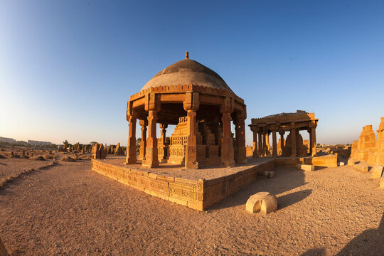 View of ancient tomb and mausoleum with dome and columns, makli, sindh, pakistan.