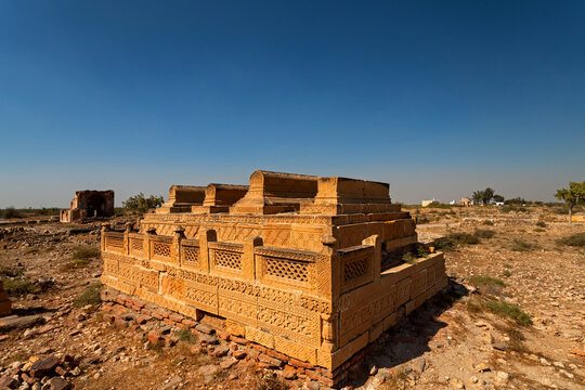 View of ancient tomb ruins and desert landscape, makli graveyard, sindh, pakistan.