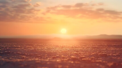 Obraz premium Blurred Sunset Over Desert Landscape with Vibrant Warm Glow and Ample Copy Space
