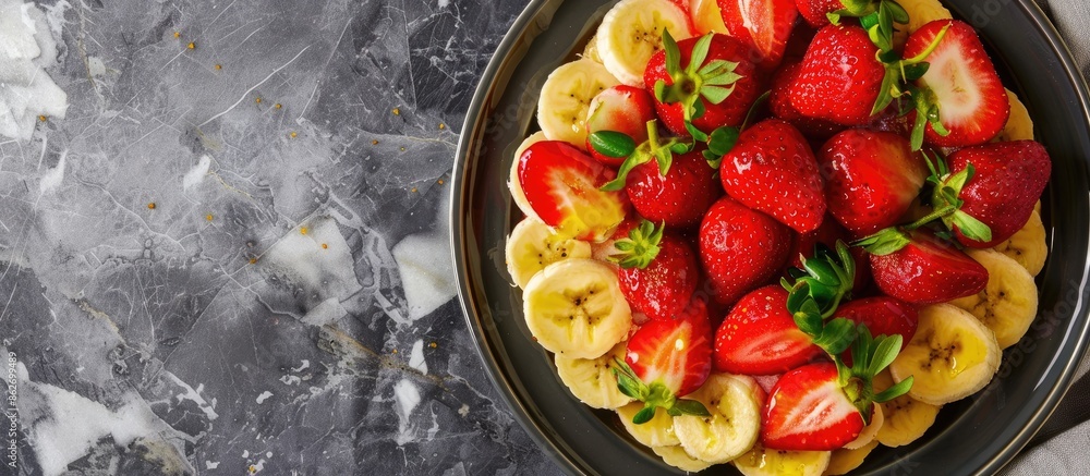 Aufkleber strawberry dessert with fresh banana on a marble background features a copy space image.