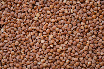 Buckwheat texture. Buckwheat-groats natural texture or background, close-up, high resolution.