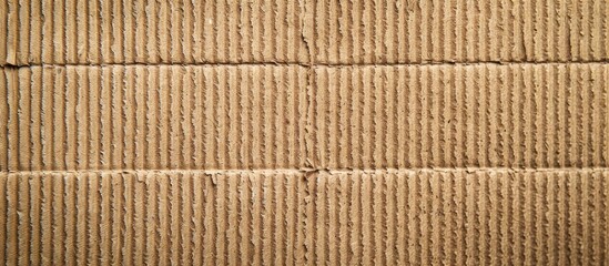 Top view of a corrugated cardboard surface serves as a recyclable background with copy space image.