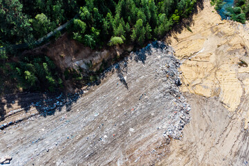 Aerial view of a garbage dump with construction waste