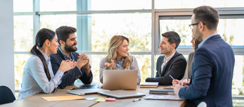 Entrepreneurs engaging in business discussions to collaboratively seek solutions and conduct strategic analysis.