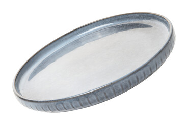 Empty blue round ceramic plate at an angle on isolated background