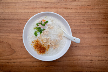 minced Chicken congee with a soft-boiled egg, a very popular breakfast dish in ASEAN