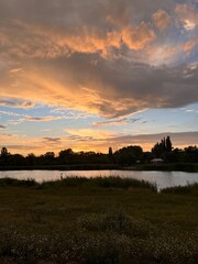 Obraz premium sunset over the river