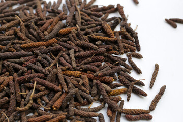 Dried long pepper or Indian long pepper
