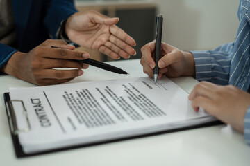 Considering buying a home, investing in real estate. Broker signs a sales agreement. agent, lease agreement, successful deal.