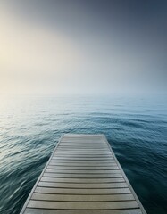 Fototapeta premium boardwalk leads out onto the sea