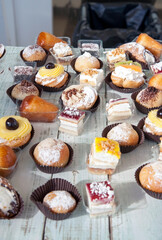 Buffet with some Italian pastries  (vertical) - Italian pastry display