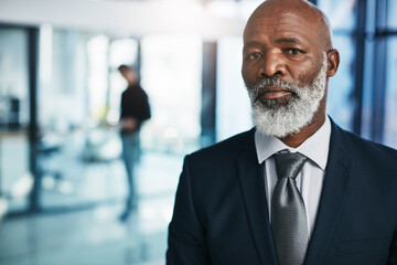 Manager, portrait and mature man in office for corporate career, business or leadership at work....