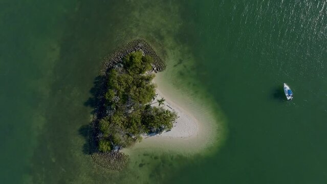Aerial view of tranquil island with boat in Biscayne Bay, Miami, Florida, United States.