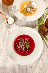 Refreshing Beetroot Soup in Sunlit White Dish on Wooden Surface – Summer Meal