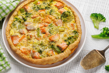 Homemade pie with salmon and broccoli