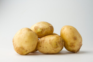 Young potatoes isolated on white background