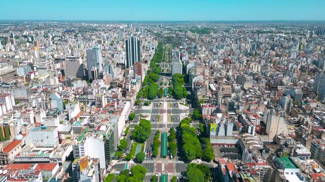 Panoramic cityscape and skyline view of Buenos Aires near landmark obelisk on 9 de Julio Avenue.