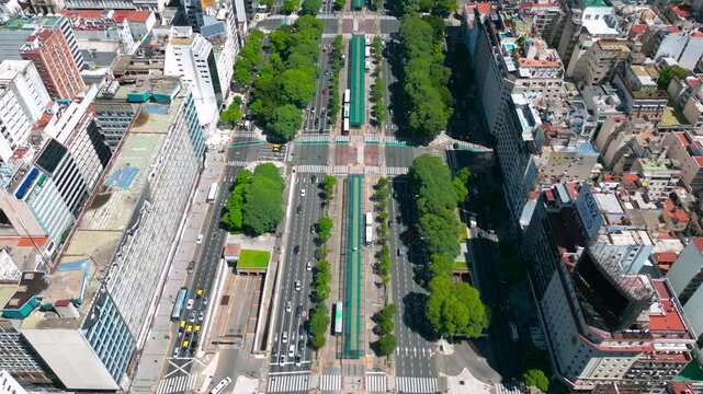 Panoramic cityscape and skyline view of Buenos Aires near landmark obelisk on 9 de Julio Avenue.