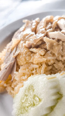 Chicken rice on a plate in a restaurant