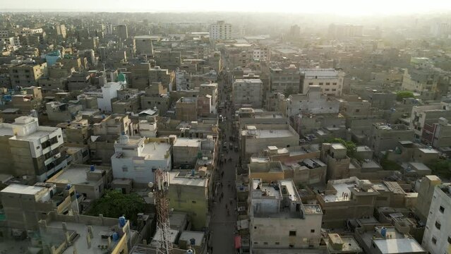 Aerial view of Lyari street at sunset with houses, Karachi, Pakistan.