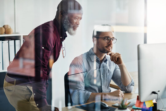 Business people, thinking and teamwork on computer for information technology or software update solution. Programmer, developer and mature manager reading online for decision, ideas and reflection