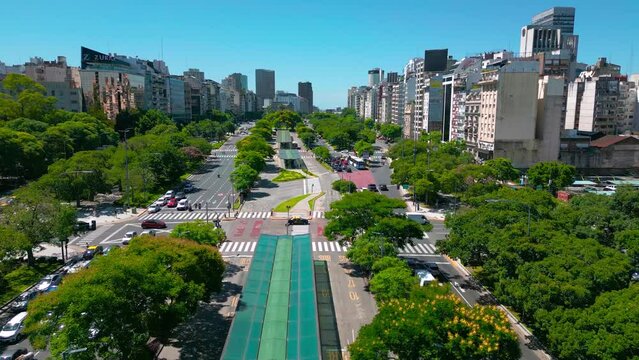 Panoramic cityscape and skyline view of Buenos Aires near landmark obelisk on 9 de Julio Avenue.