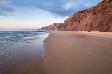 Aerial Drone Perspective of Cordoama Beach's Sandy Shores in Algarve