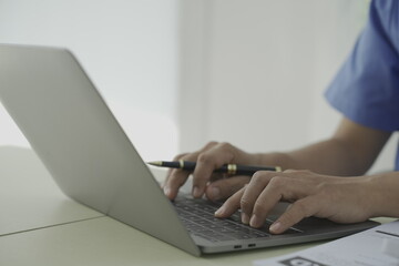 Pharmacist holds a prescription and tries to explain how to use the medicine to a patient. Pharmacy. Asian female health worker is explaining a prescription to a patient. Medicine Pharmacist.