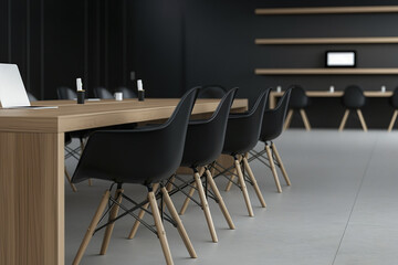 Interior of a modern office meeting room in black and white, featuring wooden furniture including a conference table with black chairs