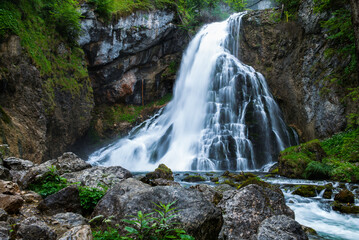 Obraz premium Breathtaking View of Gollinger Waterfall in the Austrian Alps