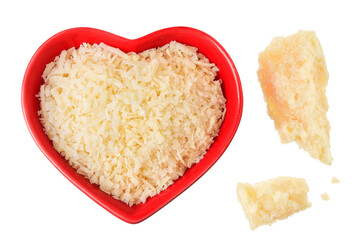 grated parmesan cheese in ceramic bowl isolated on white background. Top view. Flat lay