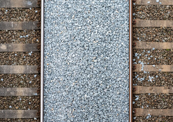 Dilbeek, Flemish Brabant, Belgium - High angle view over railway tracks and gravel