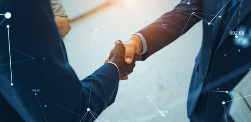 Multinational business people shaking hands and communication network concept