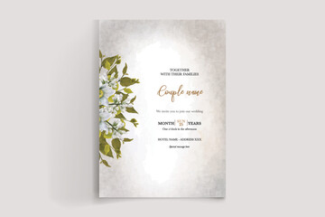 WEDDING INVITATION FRAME WITH FLOWER DECORATIONS AND FRESH LEAVES 