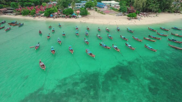 Aerial view of anchored fishermen boats on tropical paradise Koh Lipe Island, Thailand.