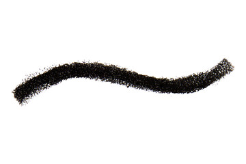 Strokes of black cosmetic pencil on blank background