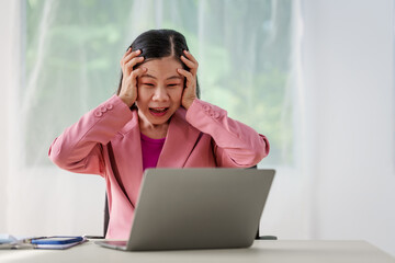 40-year-old middle-aged Asian businesswoman wearing pink suit, business finance, investment strategies, risk management. Skilled in planning, analysis, operations control for business success.