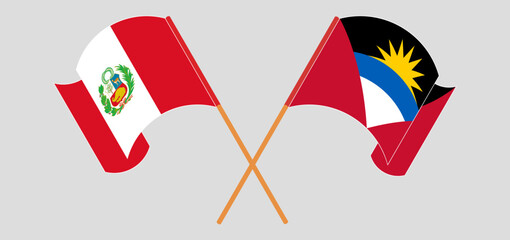 Crossed and waving flags of Peru and Antigua and Barbuda