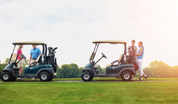 Golf cart, people and happiness with hobby, game and leisure with weekend break, bonding together and smile. Group, players and buggy with friends, recreation and fun with activity, sports and joyful