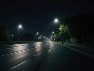 Fototapeten Empty wet asphalt road at night illuminated by street lights. Concept of loneliness, travel, journey, and darkness © zainal
