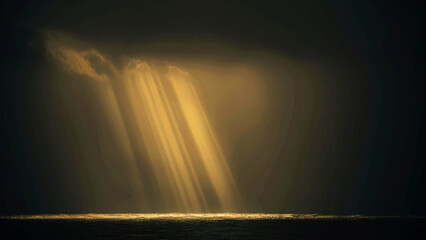Light of Faith. View of a stormy sea with golden rays of sun shining through the clouds. 