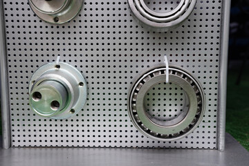 different bearings on a metal background. Part of mechanism.