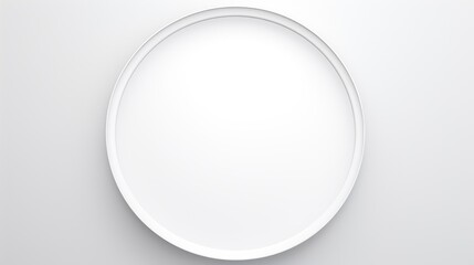 A classic, circular frame with a polished finish, its simplicity highlighting the beauty of the pure white background.