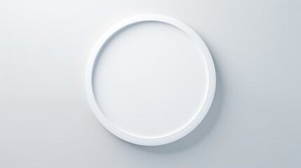A classic, circular frame with a polished finish, its simplicity highlighting the beauty of the pure white background.