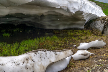 rest from avalanche, snow melting in the Alps of Vorarlberg make tunnel in the avalanche, snow on...
