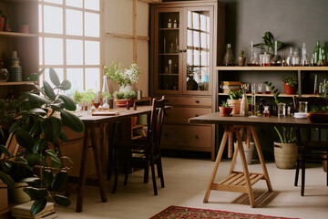 Two wooden tables with equipment for creating perfumery, huge number of plants and wooden furniture in fragrance laboratory