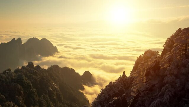 Sunrise time lapse looking out over a sea of fog at the Yellow Mountains (Huangshan) in China