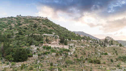 Fototapeta premium Aerial panoramic view of Sparta city with Taygetus mountains and ancient ruins remains in Peloponnese, Greece